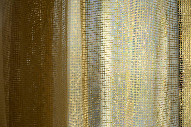 istock Curtains in sunlight. Curtains on window. Fabric shines through. 1390073758