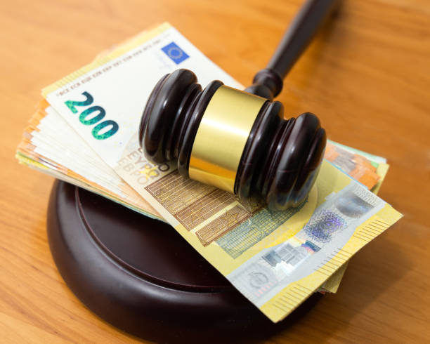 Gavel on banknotes stock photo