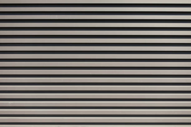 istock Texture of panel. Ribs on wall. Architecture details. 1390073823