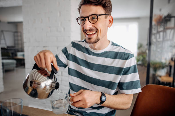 istock Man having a cup of tea 1390074000
