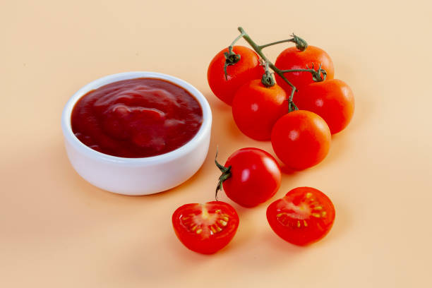 istock Freshly prepared ketchup with ripe red tomatoes 1390077221