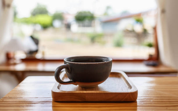 istock Cup of coffee in coffee shop 1390077843