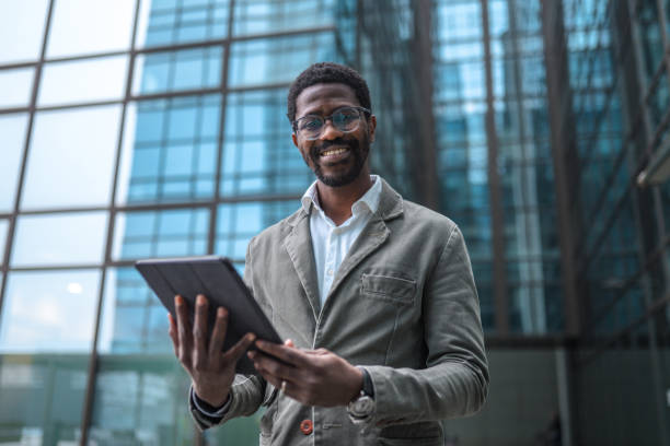 istock African American Businessman in 40s Using A Digital Tablet 1390077966