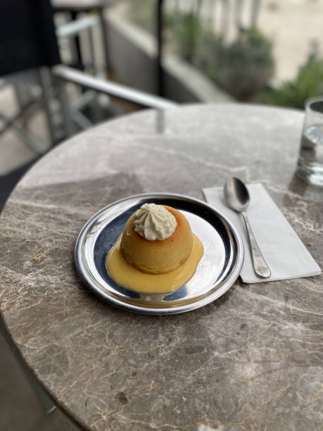 istock French desssert baba au rhum with whipped cream close up. Rum Baba 1390079643