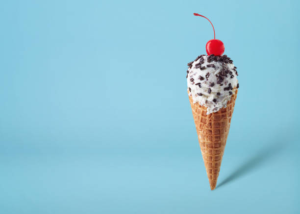 istock Vanilla chocolate chip ice cream scoop in waffle cone 1390080565