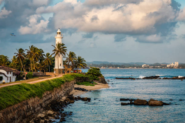 Lighthouse in fort in Galle at sunrise - Sri Lanka Lighthouse in fort in Galle at beautiful sunrise - Sri Lanka southern sri lanka stock pictures, royalty-free photos & images
