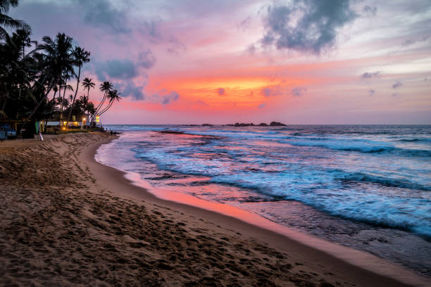 istock tropical sunset and ocean 1390081336