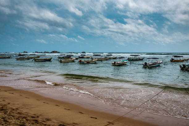 istock many boats moored near the beach 1390082404