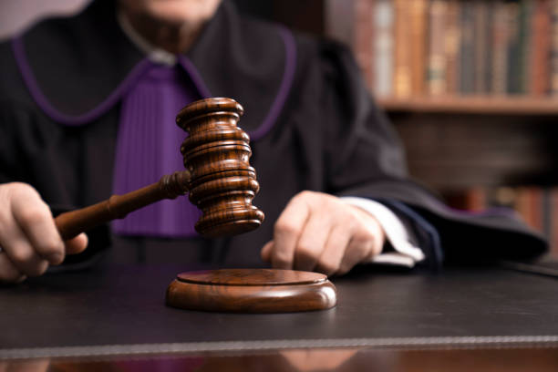 istock Judge in the courtroom. 1390083830