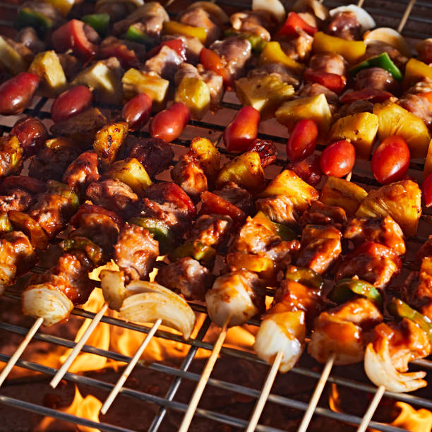 istock barbecue grill with smoke and flames 1390091655