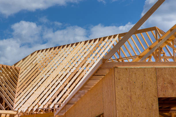 istock Home construction the frame of house beginning of roofing construction 1390093208