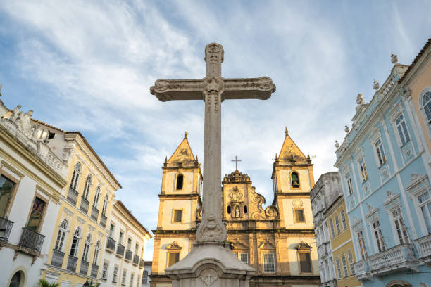 holy cross on historic town square in Pelourinho quarter in Salvador da Bahia historic square in Pelourinho quarter in Salvador da Bahia with São Francisco Church in the background sao francisco church bahia state stock pictures, royalty-free photos & images