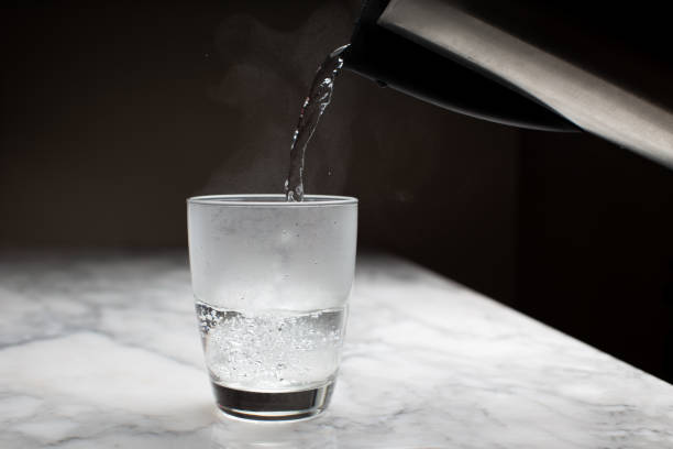 istock Pour hot water at night 1390096616