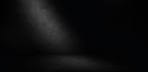 istock Dark concrete room background. Empty three dimensional room for mock up, product display or photography backdrop. 1390097617