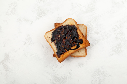 Aussie savory toasts for breakfast. Vegemite is a very popular yeast based spread in Australia.