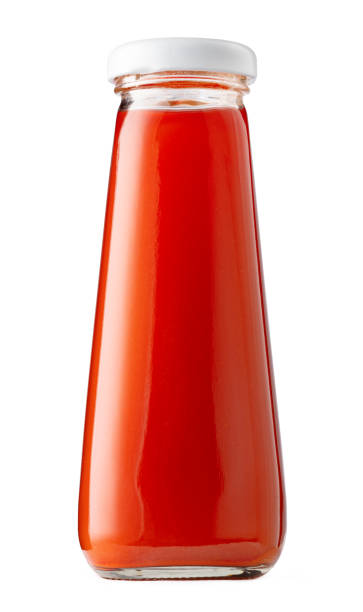 istock Bottle of tomato juice isolated on white background 1390104347