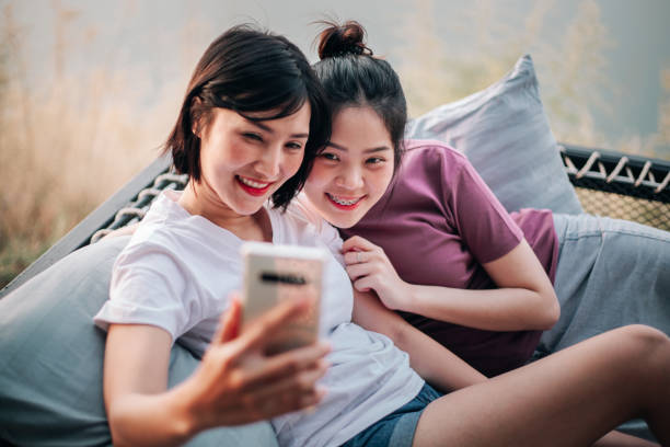 istock two women taking a selfie 1390108610