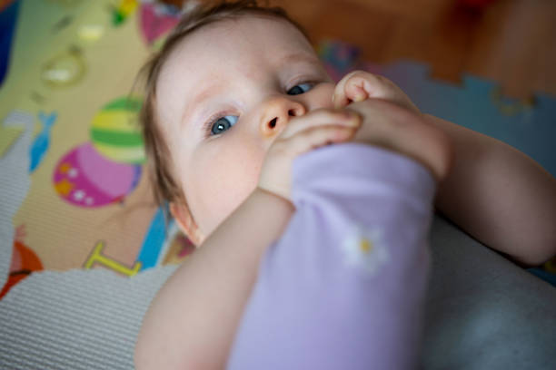 Baby lying on the floor