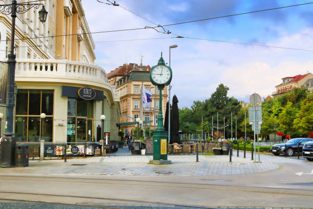 Restaurant Korzo (left) and clock at Hviezdoslavovo Square, Bratislava, Slovakia stock photo