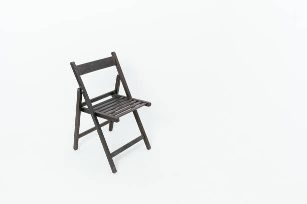 istock Black wooden folding chair with backrest on white background 1390114929