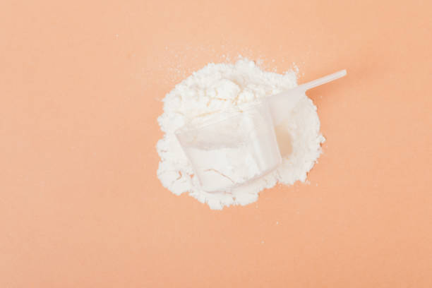 istock Sports nutrition powder with protein spoon 1390115011