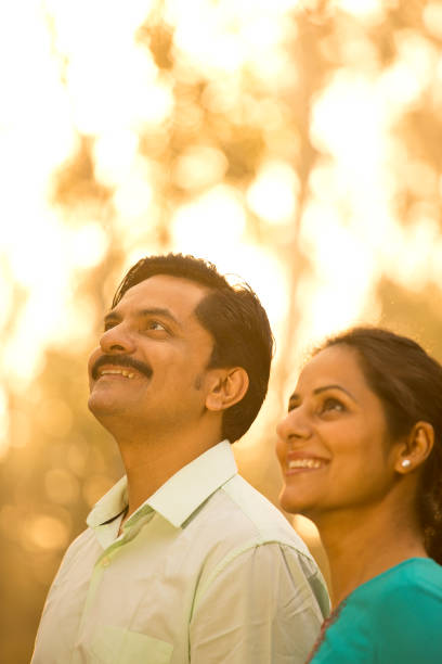istock Couple admiring view at park 1390117917