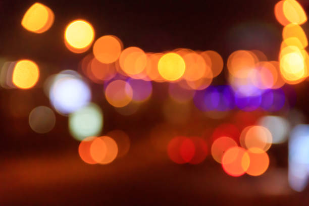 Abstract background of blurred city lights with bokeh effect