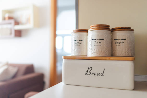 Close-up of kitchen decoration in a hotel room. Holders for coffee, tea, sugar and bread.