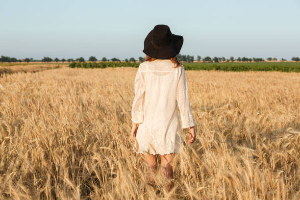 istock Amazing young lady in the field 1390120970