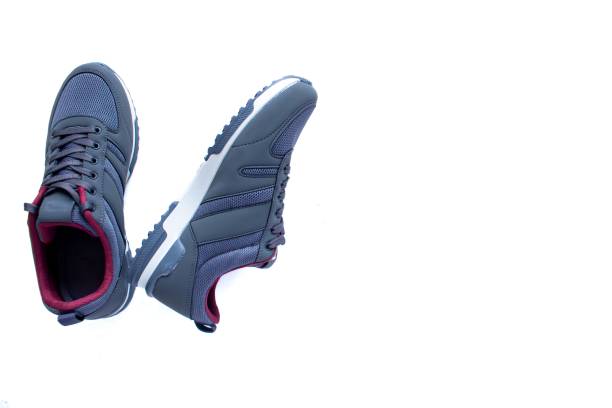 istock Pair of blue sneakers, top view 1390125609