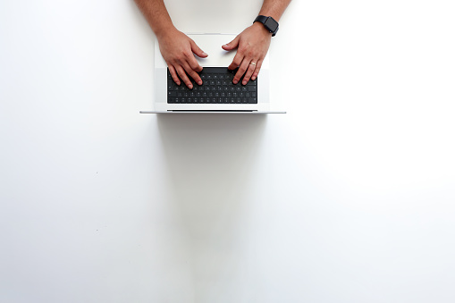 Businessman Working At Notebook With Copy Space