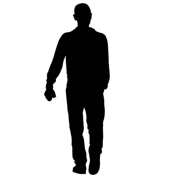 istock Silhouette of a walking man on a white background 1390127186