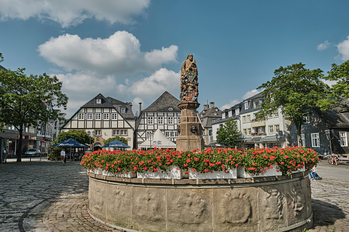 Aachen, Germany - Apr 18th 2022: Aachen town square in front of historical town hall is a famous place to spend sundays with friends and family.