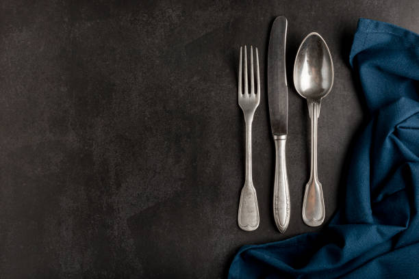 istock Antique cutlery on the table. Vintage cutlery. 1390133068