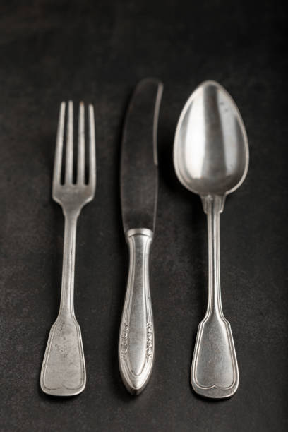 istock Antique cutlery on the table. Vintage cutlery. 1390133092