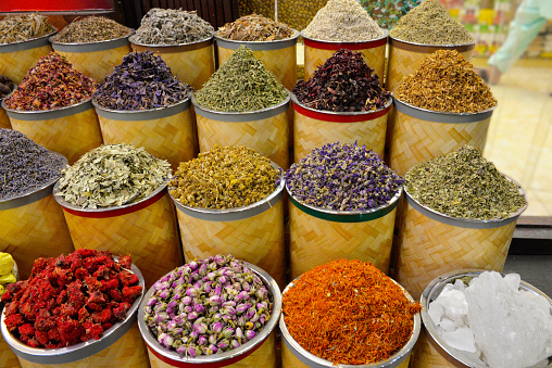 Colorful baskets with colorful spices, teas and herbs for sail.