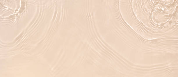 istock banner background transparent beige clear water surface texture 1390135068