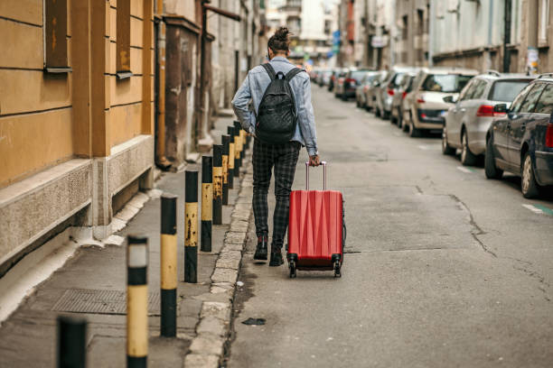 istock Traveling with Luggage 1390137853