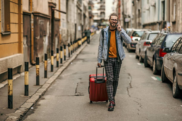 istock Traveling with Luggage 1390137958