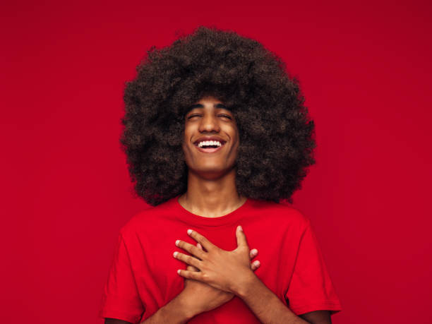 istock Portrait of emotional afro guy 1390142225