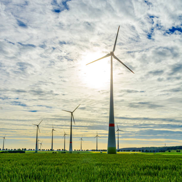 istock Wind turbines in agricultural landscape 1390144561