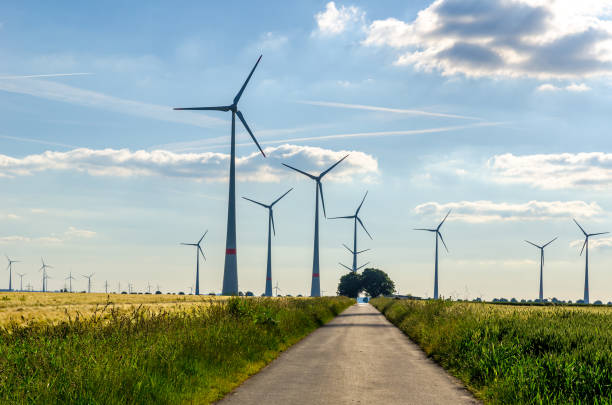 istock Wind turbines in agricultural landscape 1390144580