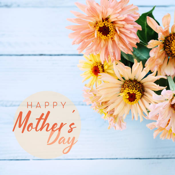 istock Mothers day floral background on wood. 1390145862