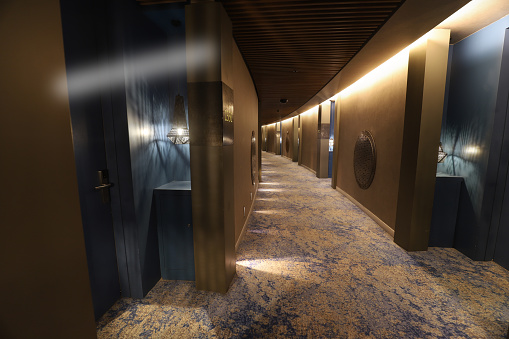 Reception desk, modern hotel reception interior with staircase