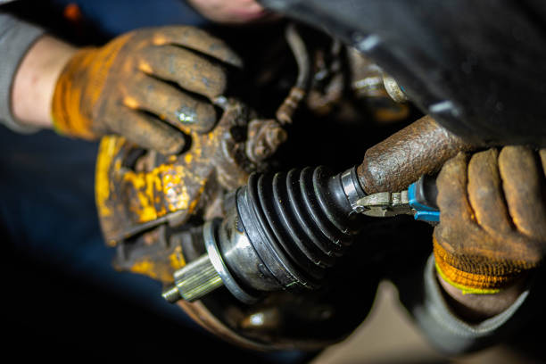 istock car drive shaft repair, CV joint and boot installation. 1390148577