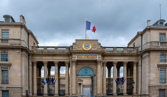 Paris, France -September 6, 2023: Close-up of the sign written on a facade of the courthouse of Paris, with the words 'Tribunal correctionnel' written in French (English translation: 'Criminal court')