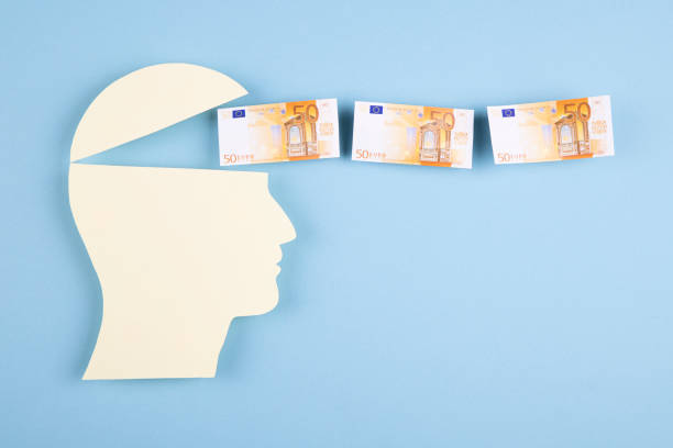 Human head in paper cut style and Euro banknotes stock photo