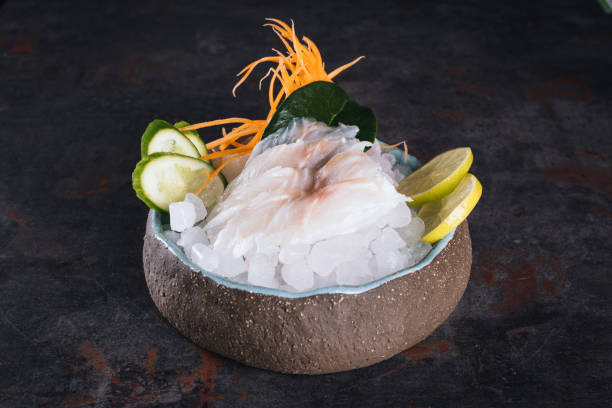 istock Poke bowl with salmon, avocado and vegetables on light background overhead view 1390160875
