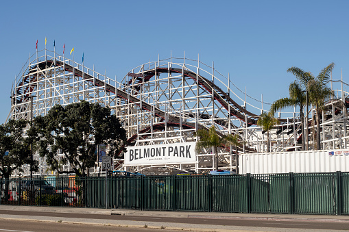 San Diego, CA, USA - Mar 24, 2022: Belmont Park, a beachfront amusement park featuring historic Giant Dipper roller coaster and Plunge pool, in the Mission Bay neighborhood in San Diego, California.