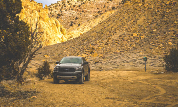 A Ford Ranger truck off roading on dirt roads and sand, in the spring of 2022 on the back roads of Utah.